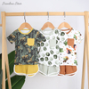 Venda superior novo design de alta qualidade 100% algodão confortável estilo verão casual manga curta terno do bebê roupas com bolso
