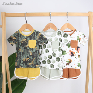 Venda superior novo design de alta qualidade 100% algodão confortável estilo verão casual manga curta terno do bebê roupas com bolso