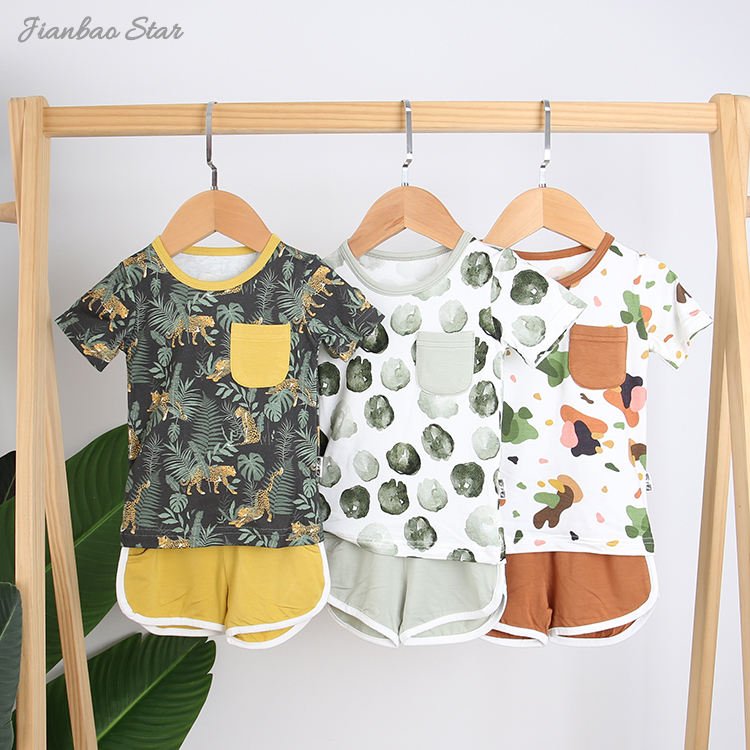 Venda superior novo design de alta qualidade 100% algodão confortável estilo verão casual manga curta terno do bebê roupas com bolso