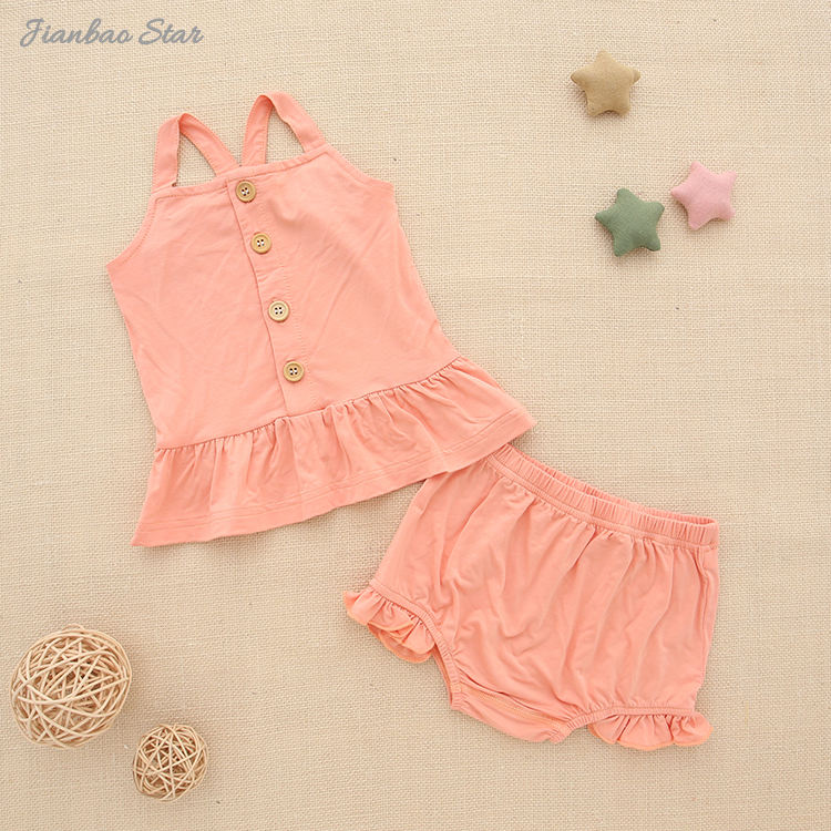 Conjunto de roupas de verão para meninas, novo e quente, com alça de ombro, tops e lindos shorts com babados, roupas de bebê de malha de bambu