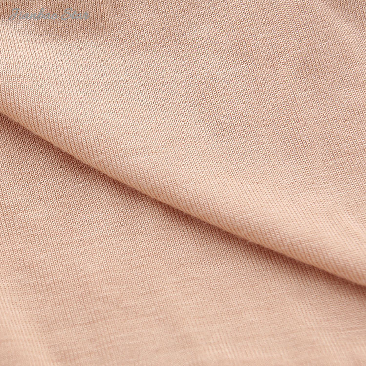 Tecido de bambu cor lisa sem mangas mangas curtas e mangas compridas Uma série de bebês meninas vestido infantil estilo babado